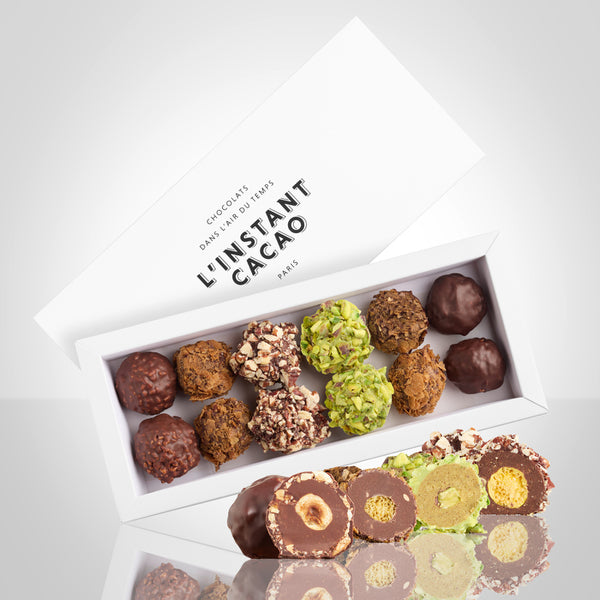 Coffret de 12 rochers : noisette noir, noisette lait, physalis-pécan, céréales et pistache et 4 rochers vus en coupe