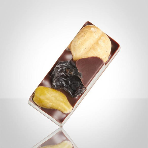 Bonbon mendiant pistache-raisin-noisette de l'Instant Cacao