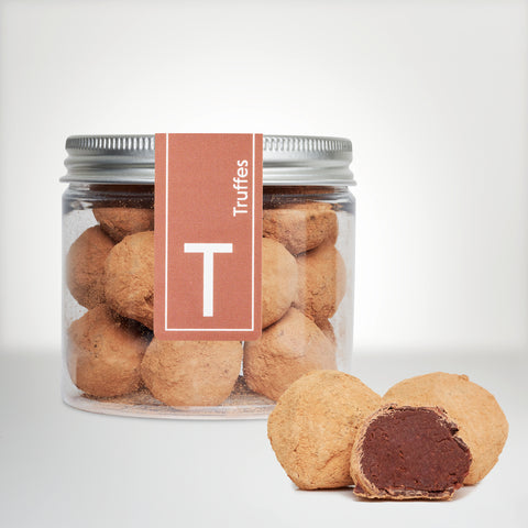 Pot de 120g de truffes au sirop d'érable avec une truffe coupée en deux